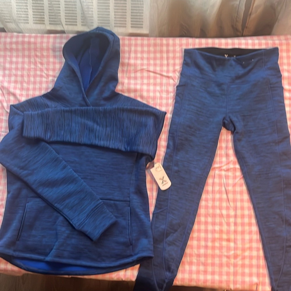 Stay warm in this Xersion Track Suit